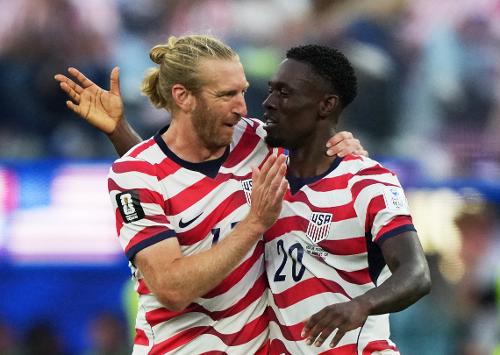 Soccer Football - FIFA World Cup 2026 - Group D - United States v Paraguay - Los Angeles Stadium, Inglewood, California, U.S. - June 12, 2026 Folarin Balogun of the U.S. celebrates scoring their second goal with Tim Ream